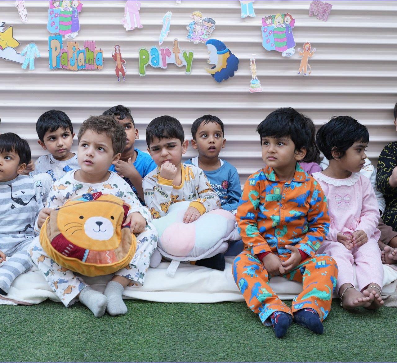 A group of children sitting together during story time